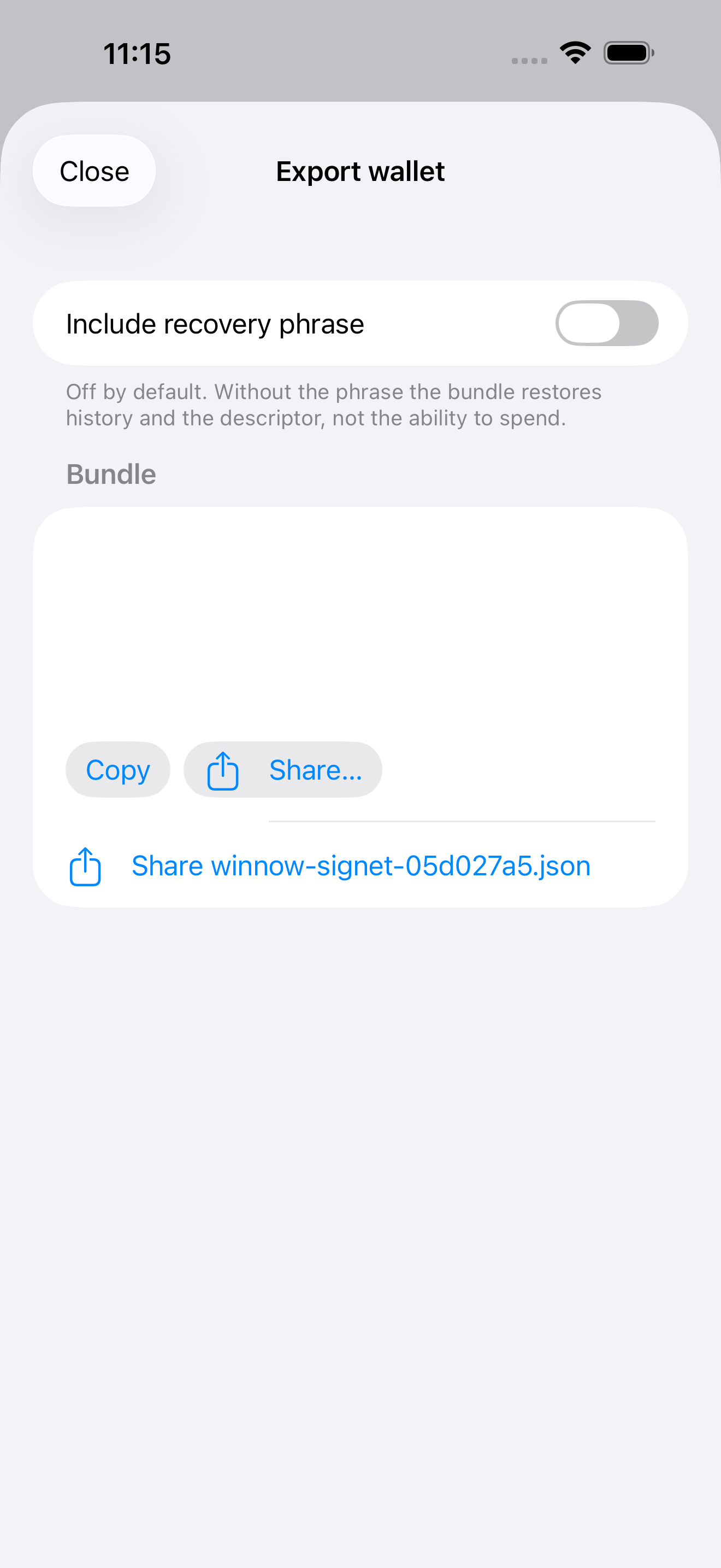 Winnow's export sheet. The recovery phrase is off by default, so the bundle restores history and the descriptor but not the ability to spend.